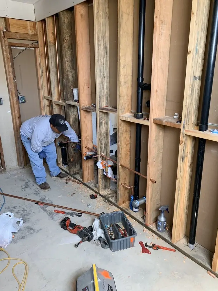 Commercial rough-in plumbing for Water Heater Replacement in Alton Homes